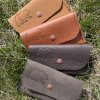 Four leather card wallets