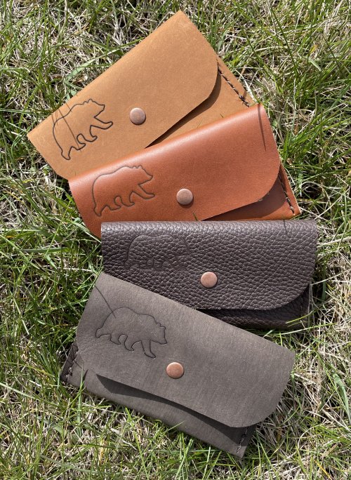 Four leather card wallets