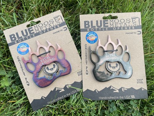Grizzly paw bottle openers engraved with "Vital Ground"