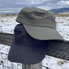 Vital Ground logo caps in a military style