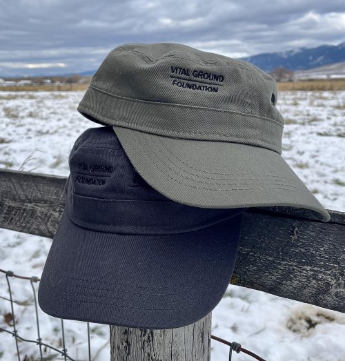 Vital Ground logo caps in a military style