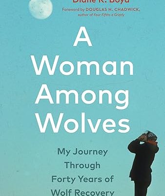 Cover of Diane Boyd's book A Woman Among Wolves which is a picture of a woman howling into the evening sky